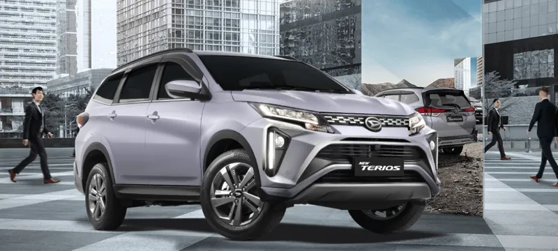 Eksterior mobil Daihatsu Terios putih, terlihat bagian samping dan depannya dengan desain modern.