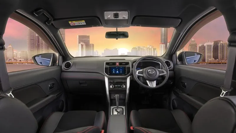 Interior kabin Daihatsu Terios, menampilkan dashboard, setir, dan kursi dengan desain modern yang nyaman.
